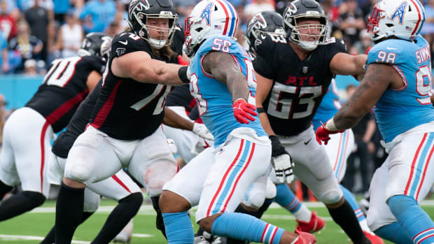 Atlanta Falcons offensive tackle Kaleb McGary (76) tries to hold off Tennessee Titans linebacker Harold Landry III (58) in the fourth quarter at Nissan Stadium in Nashville, Tenn., Sunday, Oct. 29, 2023. Chris Lindstrom.
